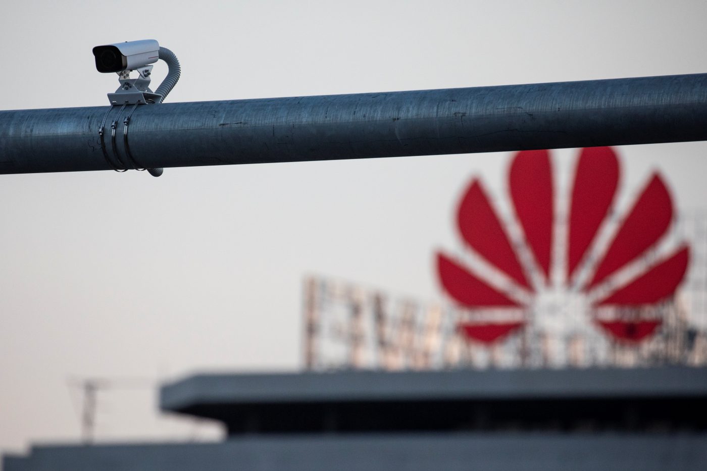 Photo: A surveillance camera is seen in front of a Huawei logo in Belgrade, Serbia, August 11, 2020. Picture taken August 11, 2020. Credit: REUTERS/Marko Djurica