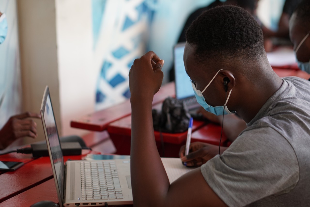 Photo: A user at an internet cafe in Ghana. Credit: Kojo Kwarteng/Unsplash License