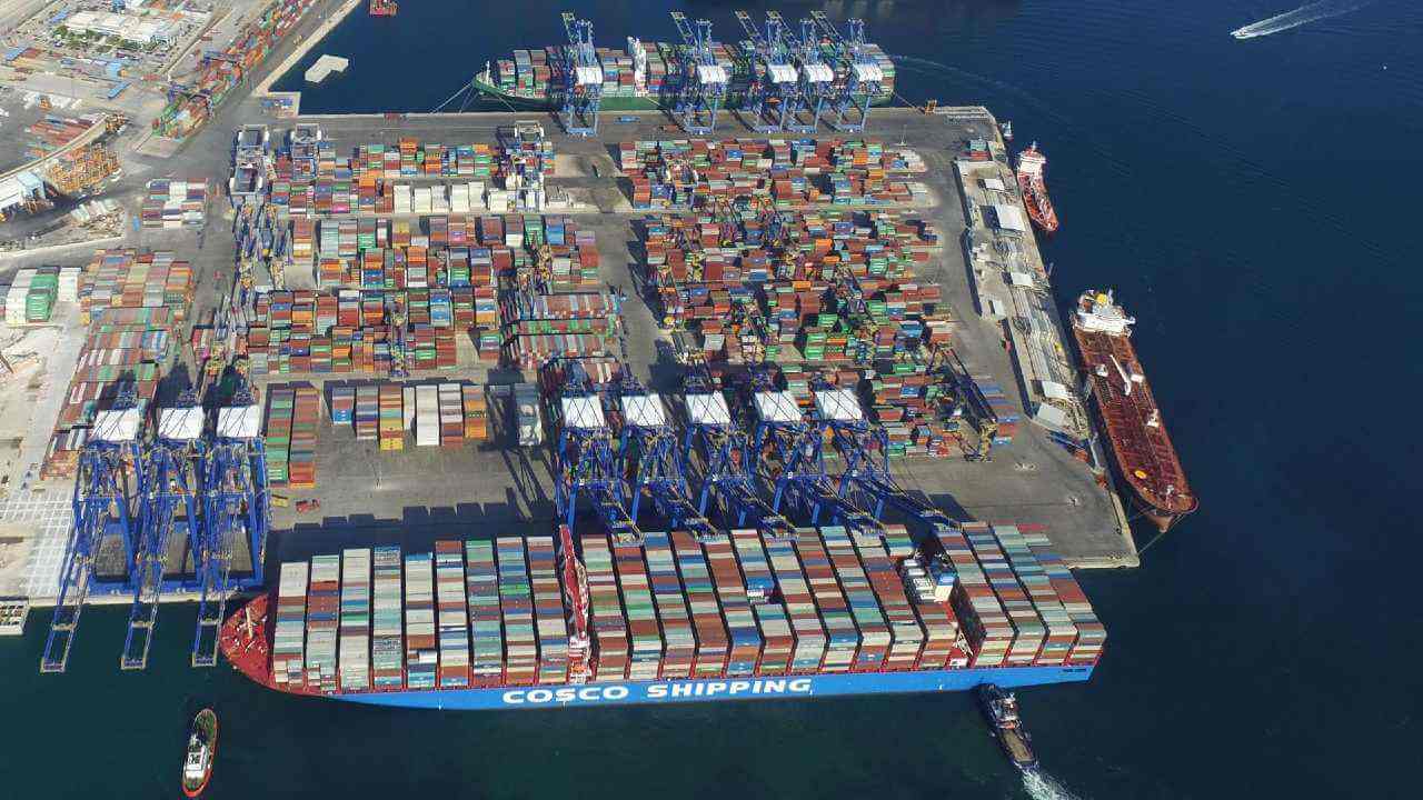Photo: The port of Piraeus seen from above with a Cosco vessel in the foreground. Credit: Piraeus Port Authority, P.A.