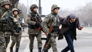 Photo: ALMATY, KAZAKHSTAN – JANUARY 10, 2022: A military patrol detains a man on Nazarbayev Street. A rise in fuel prices sparked protests in the towns of Zhanaozen and Aktau in western Kazakhstan on January 2 and spread rapidly across the country. On January 5, President Tokayev dismissed the cabinet and declared a two-week state of emergency in the Mangistau and Almaty regions as well as in the cities of Almaty and Nur-Sultan. On January 6, a counterterrorism operation to stop mass unrest began. Credit: Valery Sharifulin/TASS.