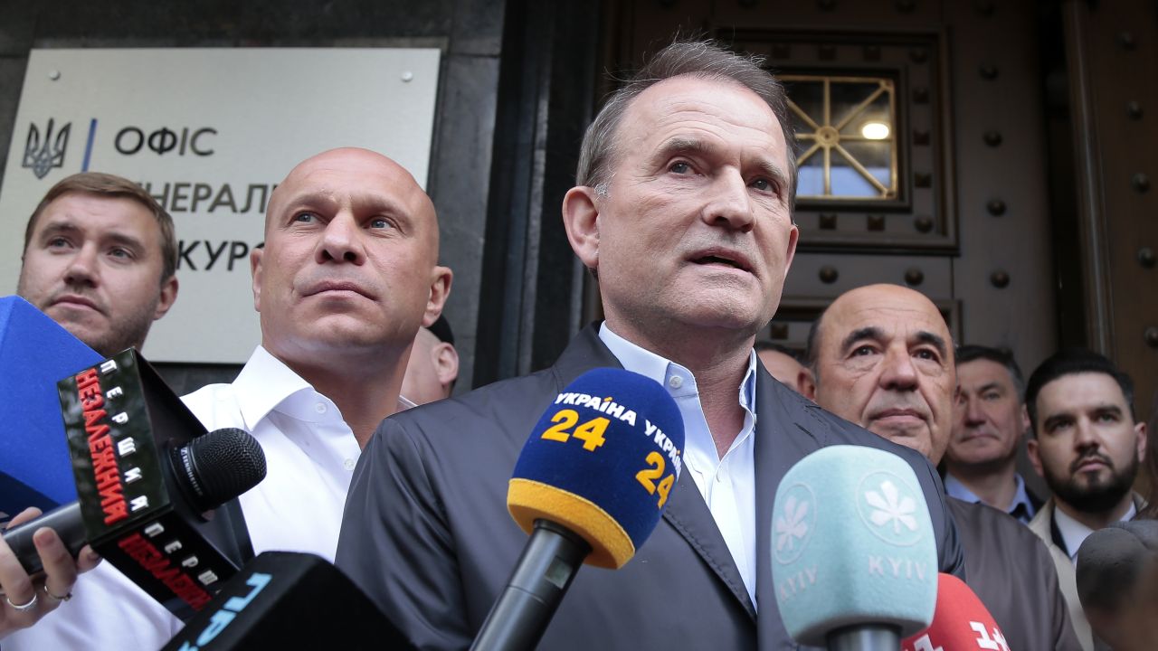 Photo: KYIV, UKRAINE – MAY 12, 2021: Viktor Medvedchuk (front), chairman of the political council of Ukraine's Opposition Platform - For Life party, who has been accused of high treason, talks to journalists outside the office of Prosecutor General of Ukraine. Pictured 2nd L is Opposition Platform - For Life party member Ilya Kiva, 3rd R is Opposition Platform - For Life party co-chairman Vadim Rabinovich. Credit: Irina Yakovleva/TASS.