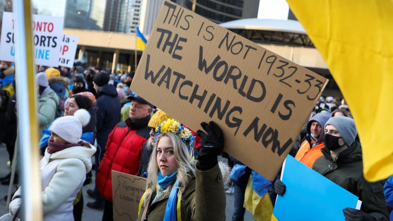 Photo: Alexandra Prockow holds up a sign as Ukrainian supporters rally after Russia launched a massive military operation against Ukraine, in Toronto, Ontario, Canada, February 24, 2022. Credit: REUTERS/Nick Lachance