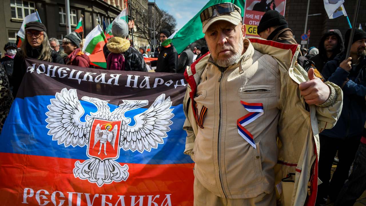 Photo: Supporters of Pro-Russian party Vazrazdane (Renascence) hold flag of Self-proclaimed Donetsk People's Republic on protest in front of Council of Ministers building during U.S. Secretary of Defense Lloyd Austin two days visit in Bulgaria on 19 March, 2022 in Sofia, Bulgaria. Credit: Georgi Paleykov/NurPhoto