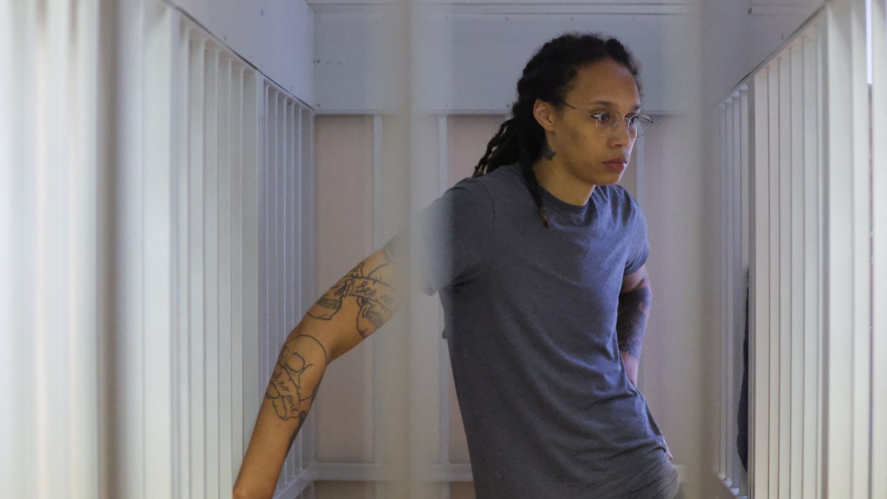 Photo: US basketball player Brittney Griner, who was detained at Moscow's Sheremetyevo airport and later charged with illegal possession of cannabis, stands inside a defendants' cage before the court's verdict in Khimki outside Moscow, Russia August 4, 2022. Credit: REUTERS/Evgenia Novozhenina/Pool