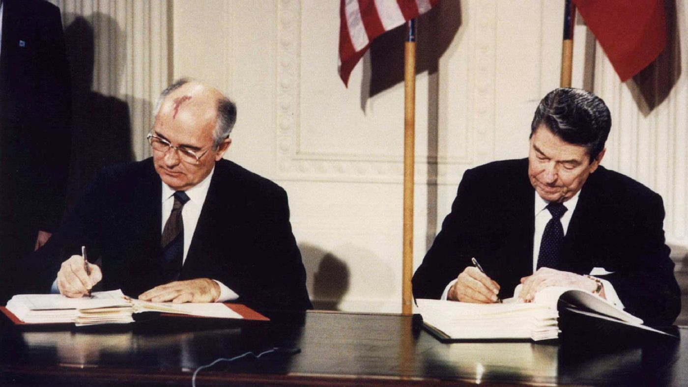 Photo: File photo of U.S. President Ronald Reagan (R) and Soviet President Mikhail Gorbachev signing the Intermediate-Range Nuclear Forces (INF) treaty at the White House, Washington on December 8 1987. Credit: REUTERS/Dennis Paquin/File Photo