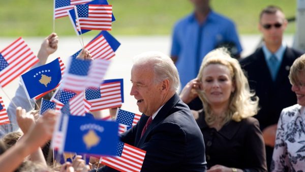Photo: Ethnic Albanian children wave U.S. and Kosovo flags as they welcome U.S. Vice President Joe Biden in Pristina Airport May 21, 2009. Biden received a tumultuous welcome upon his arrival to Kosovo on Thursday just hours after leaving Serbia where thousands of police kept streets empty to avoid protests. Credit: REUTERS/Hazir Reka