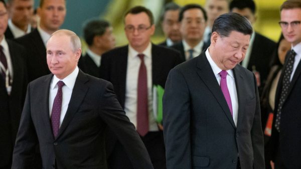 Photo: Russian President Vladimir Putin and Chinese President Xi Jinping walk during their meeting at the Kremlin in Moscow, Russia June 5, 2019. Credit: Alexander Zemlianichenko/Pool via REUTERS