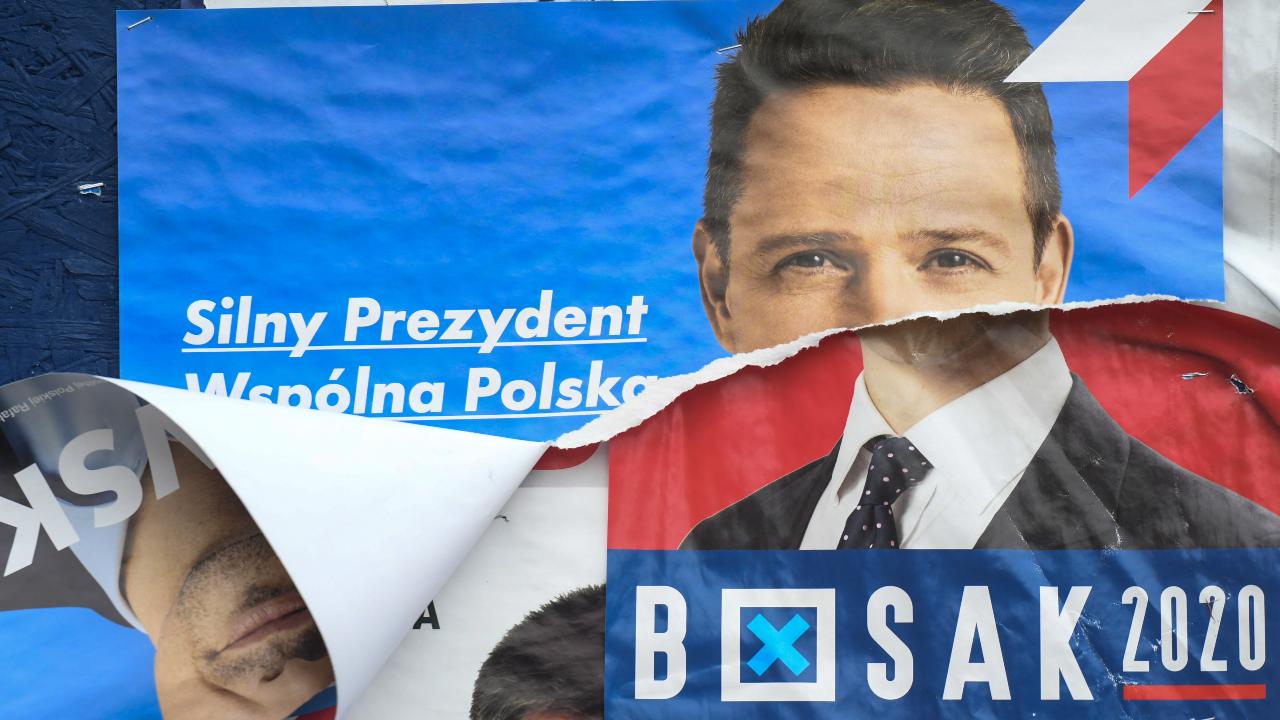 Photo: A vandalised election poster of Rafal Trzaskowski, the current Mayor of Warsaw and Civic Platform's candidate for Presidency of Poland, seen in Krakow. Poland's outgoing president Andrzej Duda failed to win an outright majority in last Sunday's 1st round of presidential election and is set to face Warsaw mayor Rafal Trzaskowski in a July 12th run-off. On July 04, 2020, in Krakow, Lesser Poland Voivodeship, Poland. Credit: Artur Widak/NurPhoto