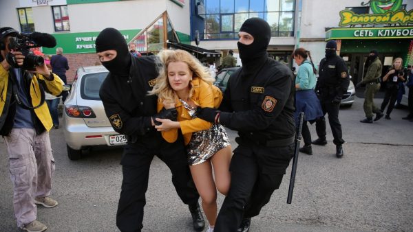 Photo: Belarusian law enforcement officers detain a woman during an opposition rally to protest against police brutality and to reject the presidential election results in Minsk, Belarus September 19, 2020. Credit: Tut.By via REUTERS