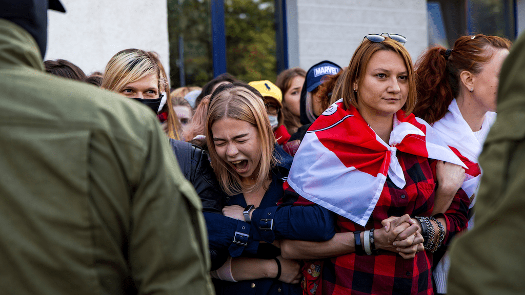 Photo: Women blocked by Belarusian law enforcement officers gather during an opposition rally to protest against police brutality and to reject the presidential election results in Minsk, Belarus September 19, 2020. Credit: BelaPAN via REUTERS.