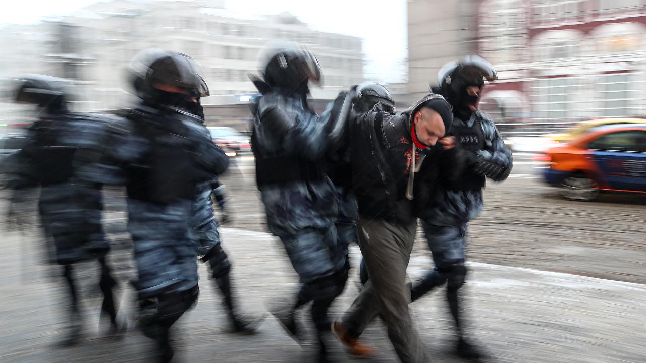 Photo: Riot police officers detain a participant in an unauthorized rally in support of Russian opposition activist Alexei Navalny in Komsomolskaya Square. In connection with calls for protests, pedestrian movement and public transport have been restricted in central Moscow. Access to several stations of the Moscow Metro has been temporarily closed, with trains passing without stopping. Valery Sharifulin/TASS.