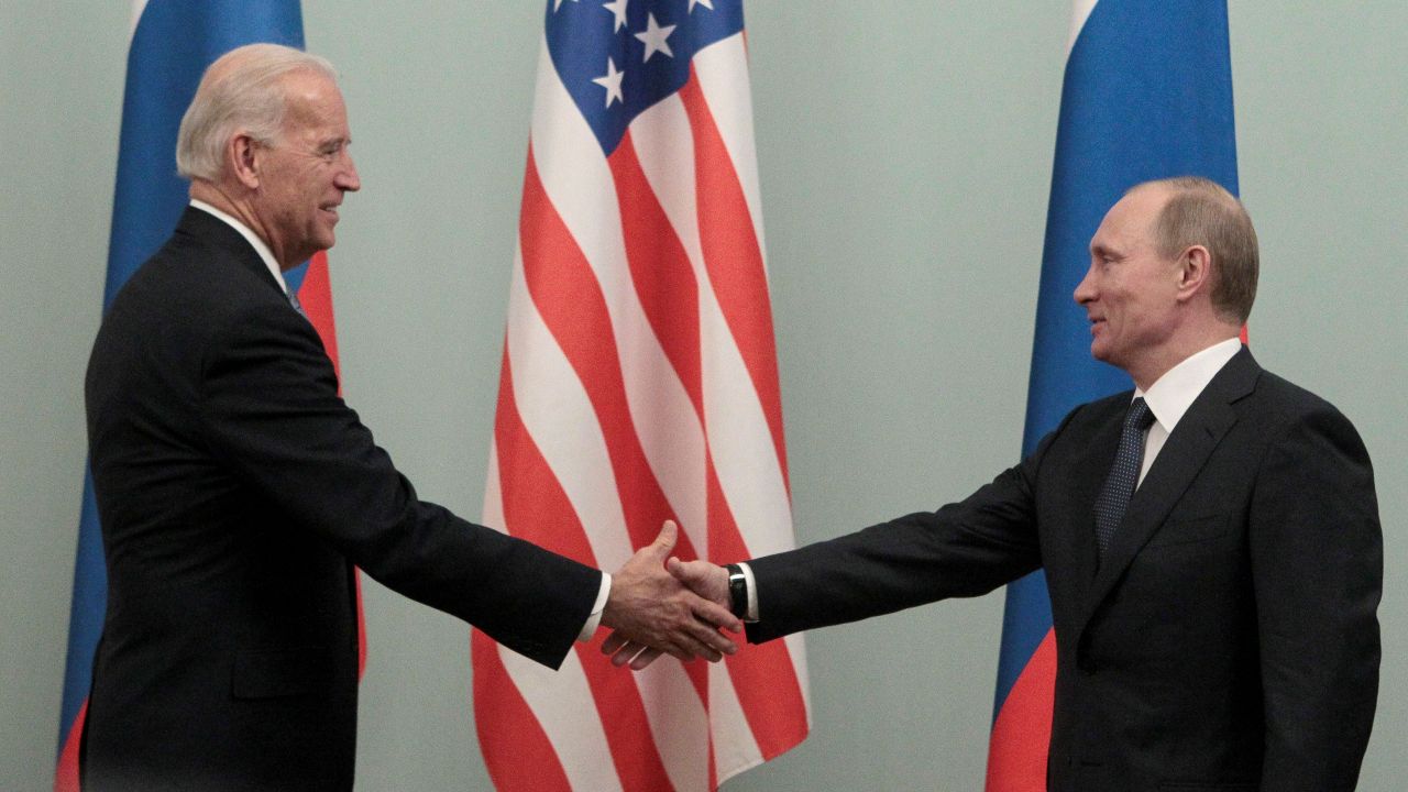 Photo: Russian Prime Minister Vladimir Putin (R) shakes hands with U.S. Vice President Joe Biden during their meeting in Moscow March 10, 2011. Credit: REUTERS/Alexander Natruskin
