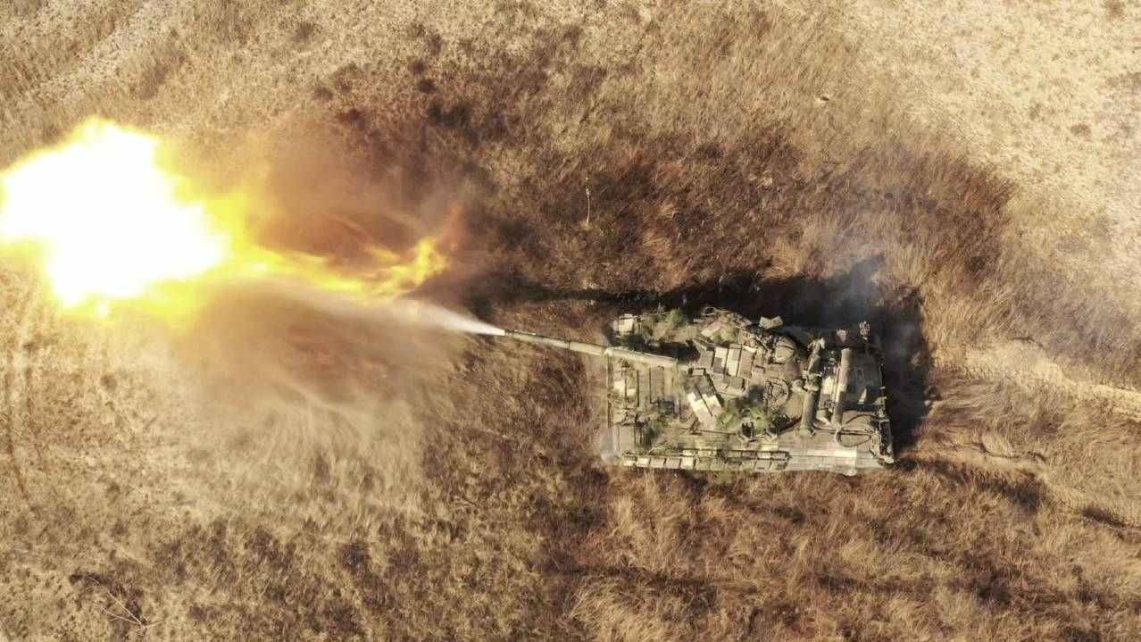 Photo: A tank of the Ukrainian Armed Forces fires during military drills at a training ground near the border with Russian-annexed Crimea in Kherson region, Ukraine, in this handout picture released by the General Staff of the Armed Forces of Ukraine press service November 17, 2021. Credit: Press Service of General Staff of the Armed Forces of Ukraine/Handout via REUTERS