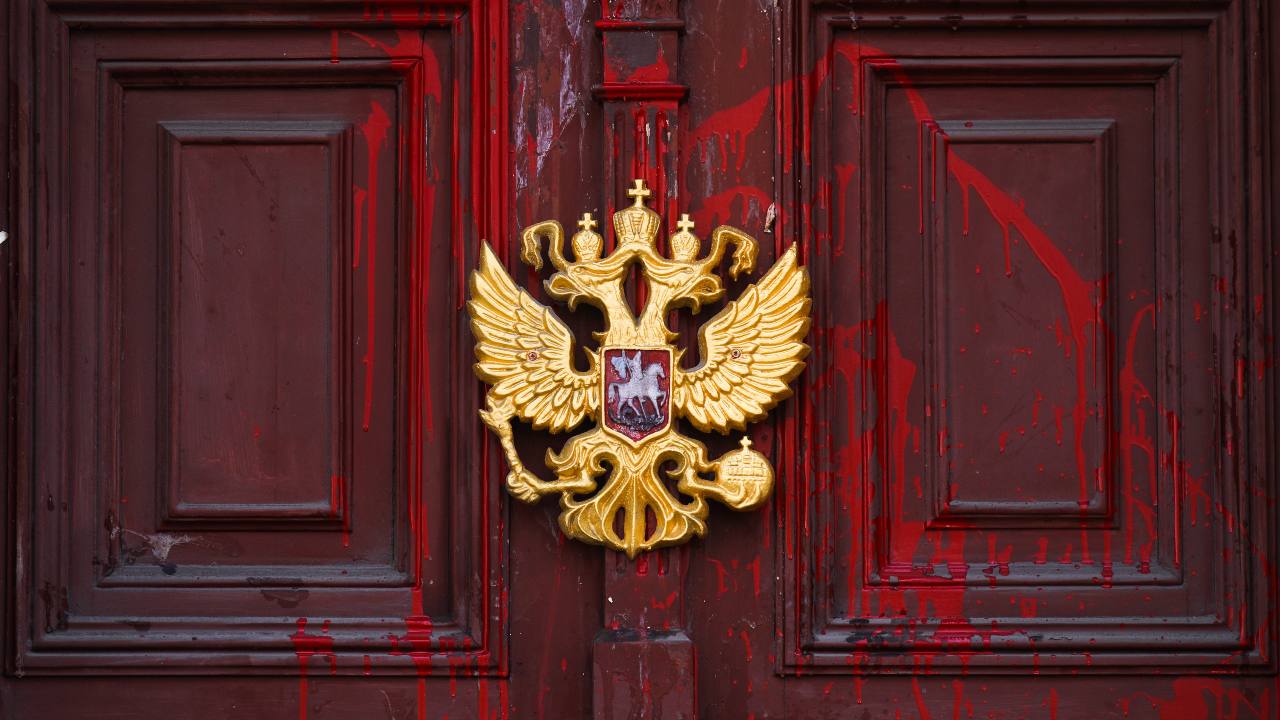 Photo: The door of the Consulate General of Russia was covered with red paint imitating blood as a sign of protest against Russian aggression against Ukraine. Krakow, Poland on March 30, 2022. Credit: Beata Zawrzel/NurPhoto