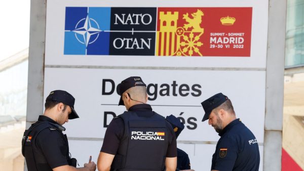 Photo: Police keep guard inside the Madrid Fair ahead of NATO Summit, in Madrid, Spain, June 27, 2022. Credit: REUTERS/Yves Herman
