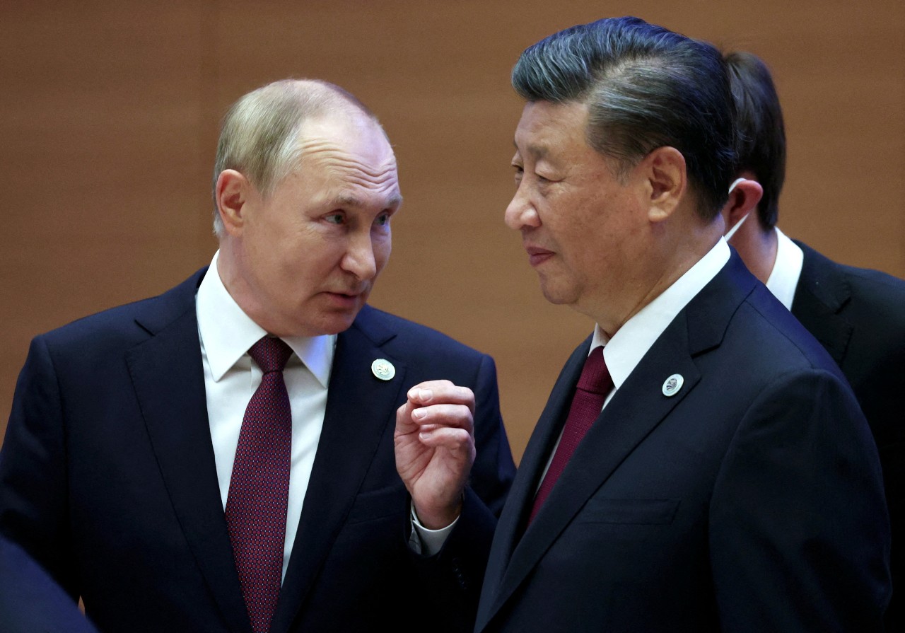 Photo: Russian President Vladimir Putin speaks with Chinese President Xi Jinping before an extended-format meeting of heads of the Shanghai Cooperation Organization summit (SCO) member states in Samarkand, Uzbekistan September 16, 2022. Credit: Sputnik/Sergey Bobylev/Pool via REUTERS