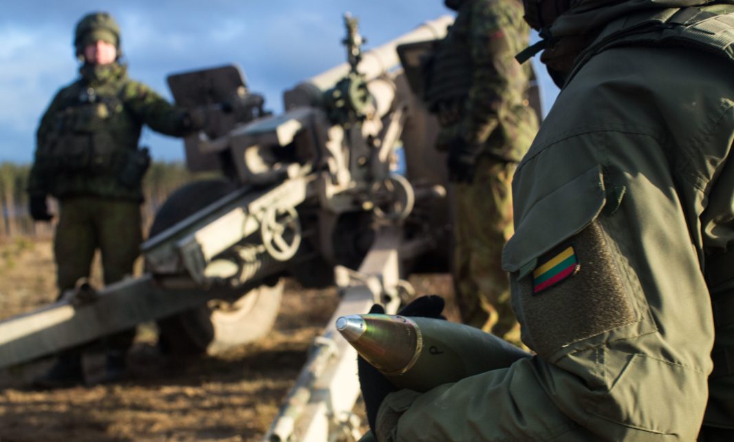 Photo: Lithuanian artillery team working in coordination Credit: Lithuanian Defense Department.