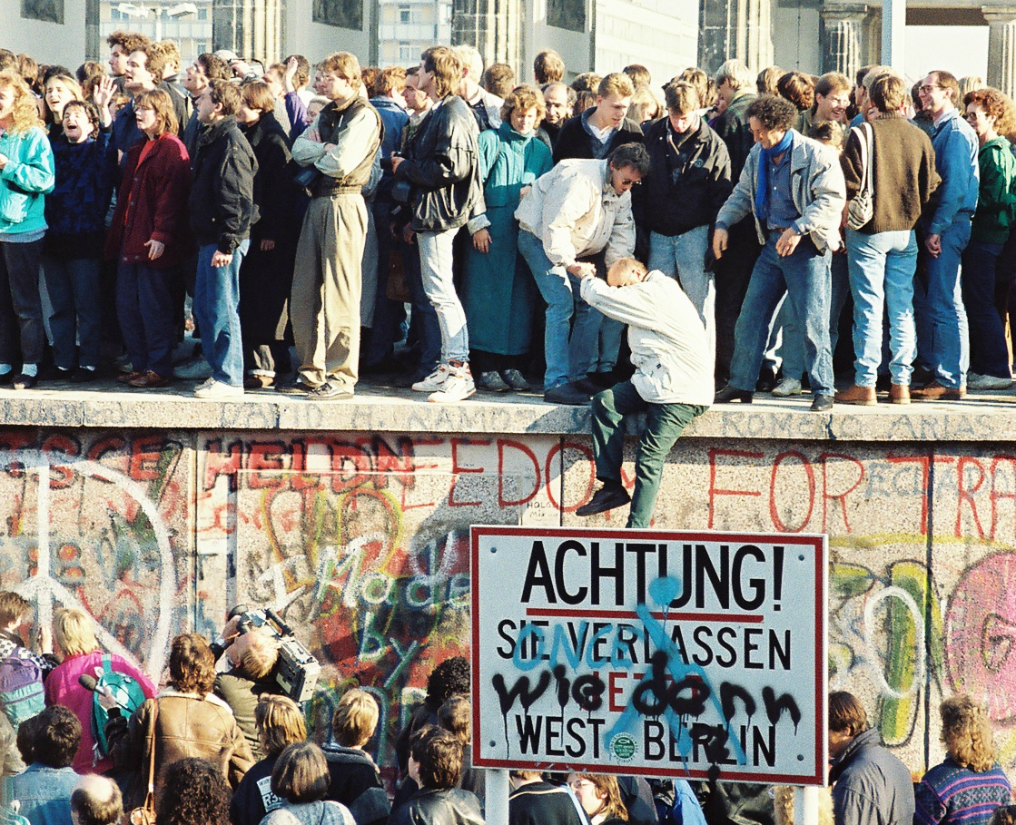 Photo: "At the Brandenburg Gate, 10 November 1989" via Sue Ream under CC BY 3.0.