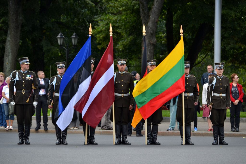 Photo: “Flags standing at the Baltic Way commemoration ceremony in Riga” by Pablo Andrés Rivero under CC BY-NC-ND 2.0.