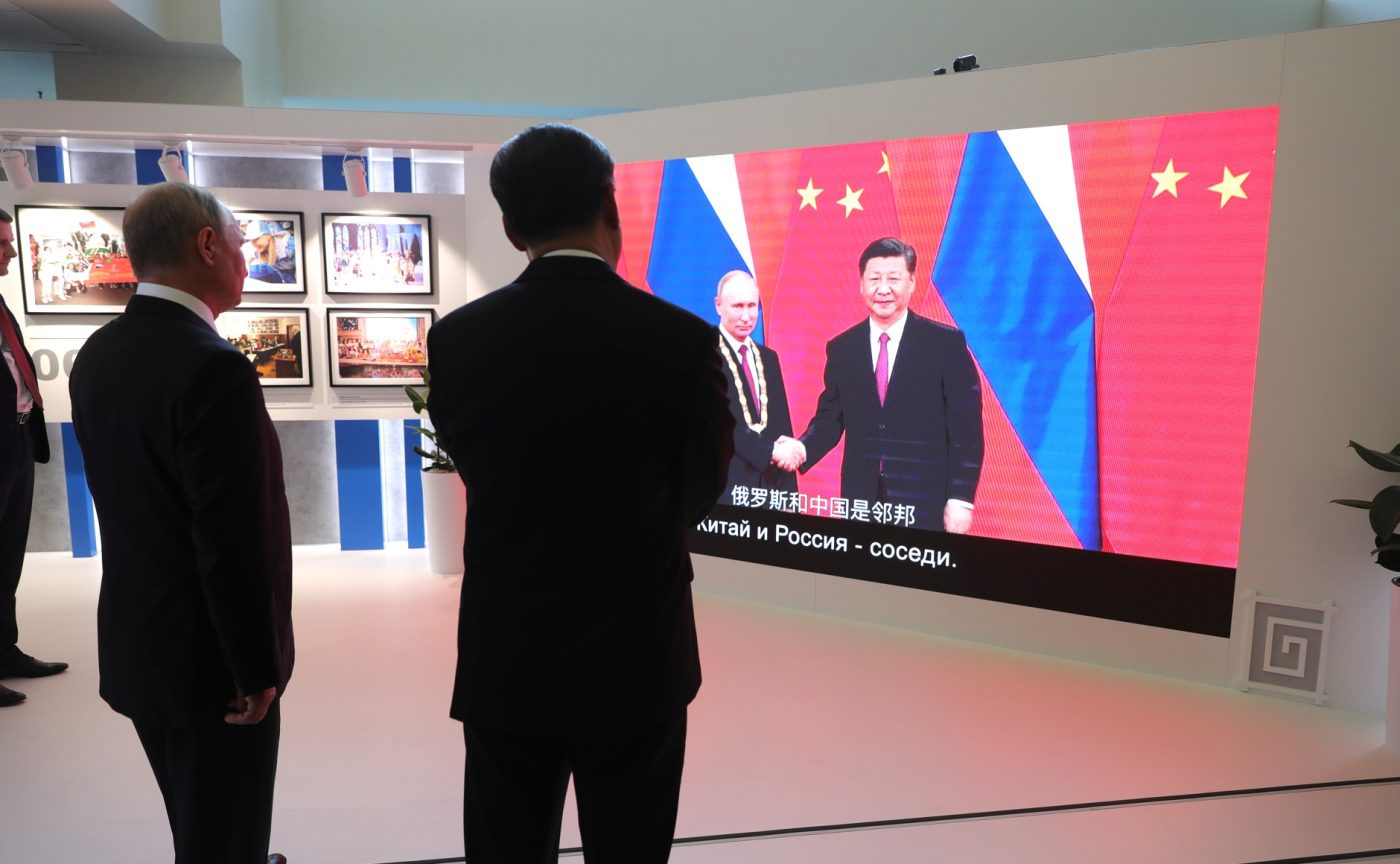Photo: "Visit to photo exhibition on history of Russian-Chinese cooperation" by the Kremlin under CC BY 4.0.
