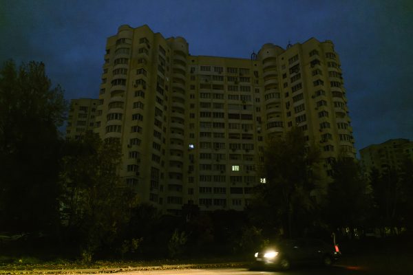 Photo: Dark windows in residential blocks during a power cut amid the Russian destruction of Ukrainian power infrastructure in Kyiv, Ukraine, October 27, 2022. Credit: Maxym Marusenko/NurPhoto