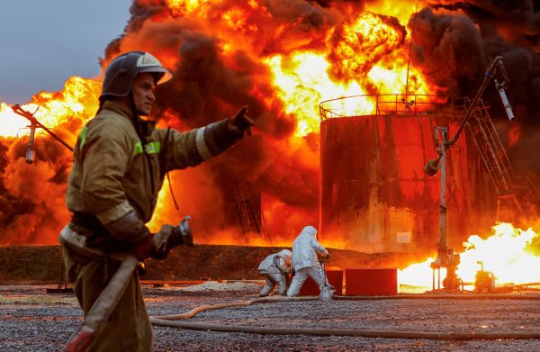 Photo: Firefighters work to extinguish fire following recent shelling at an oil storage facility in the course of Russian sabotage of Ukrainian infrastructure in the town of Shakhtarsk, October 27, 2022. Credit: REUTERS/Alexander Ermochenko