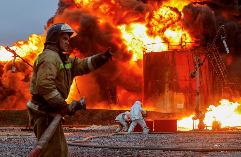 Photo: Firefighters work to extinguish fire following recent shelling at an oil storage facility in the course of Russian sabotage of Ukrainian infrastructure in the town of Shakhtarsk, October 27, 2022. Credit: REUTERS/Alexander Ermochenko
