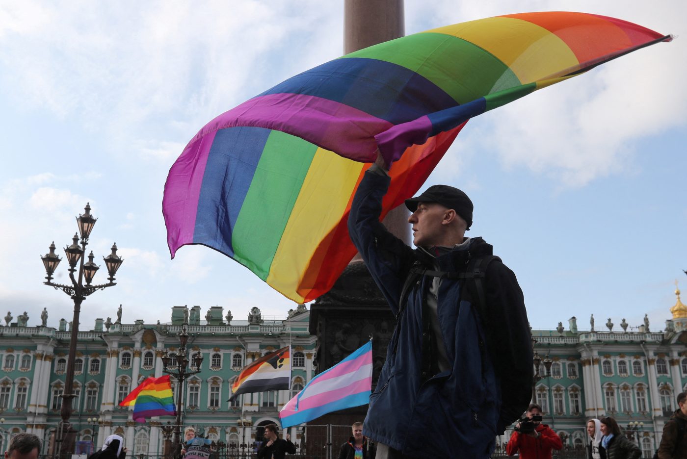 Photo: A participant waves a rainbow flag during the LGBT community rally "X St.Petersburg Pride" in central Saint Petersburg, Russia August 3, 2019. Credit: REUTERS/Anton Vaganov/File Photo