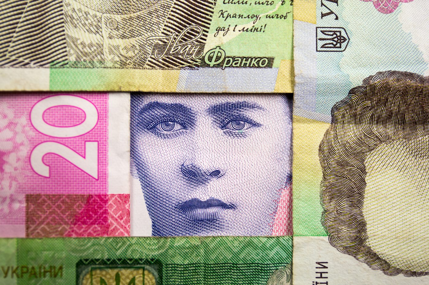 Photo: 200 Ukrainian Hryvnias banknote with the image of Lesya Ukrainka and other Ukrainian hryvnia banknotes. Credit: Karol Serewis / SOPA Images/Sipa USA