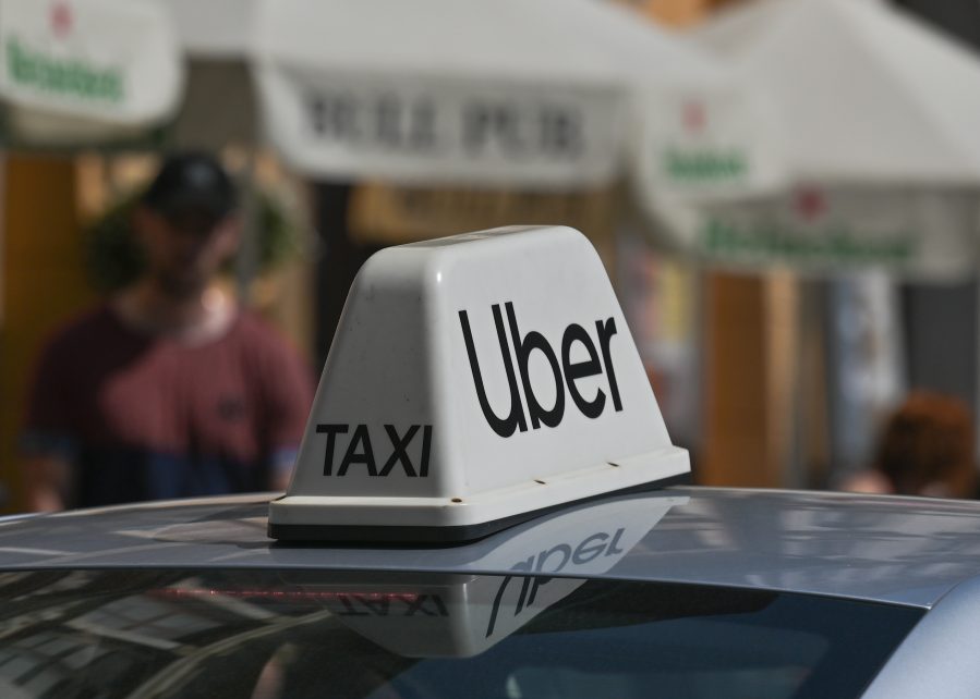 Photo: An Uber car is waiting for customers in the center of Krakow on Sunday, August 14, 2022. Credit: Artur Widak/NurPhoto