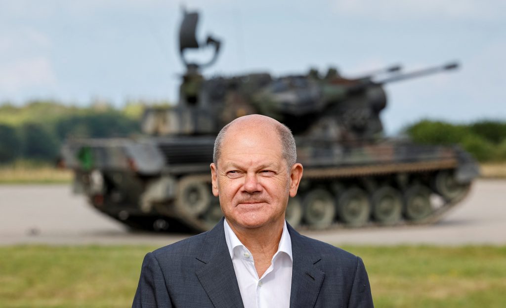 Photo: German Chancellor Olaf Scholz stands in front of a German self-propelled anti-aircraft gun Flakpanzer Gepard during a visit of the training program for Ukrainian soldiers on the Gepard anti-aircraft tank in Putlos near Oldenburg, Germany August 25, 2022. Credit: Axel Heimken/Pool via REUTERS