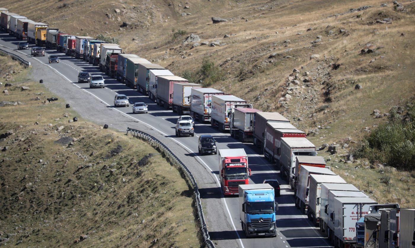 Photo: Travellers from Russia drive after crossing the border to Georgia at the at the Zemo Larsi/Verkhny Lars station, Georgia September 26, 2022. Credit: REUTERS/Irakli Gedenidze