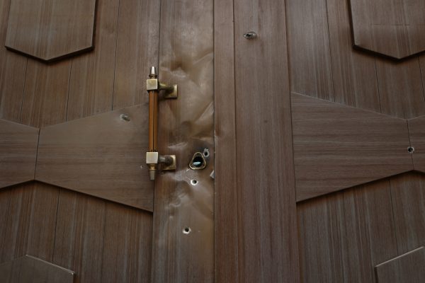 Photo: A view shows bullet holes on a door after an attack at the Embassy of the Republic of Azerbaijan, in Tehran, Iran, January 27, 2023. Credit: Majid Asgaripour/WANA West Asia News Agency