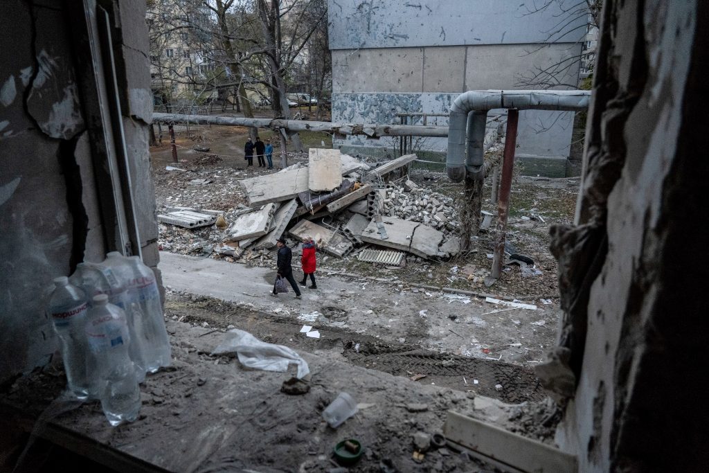 Photo: Residents were seen walking outside the damaged residential building. A Russian missile attack on a residential building in the Inhulskyi district of Mykolaiv, a southern city in Ukraine. The deadly attack killed at least 7. Mykolaiv is a city 50 km away from Kherson city, where the Ukrainian force has gained a huge battlefield success in the past couple of days. Credit: Photo by Ashley Chan / SOPA Images/Sipa USA.