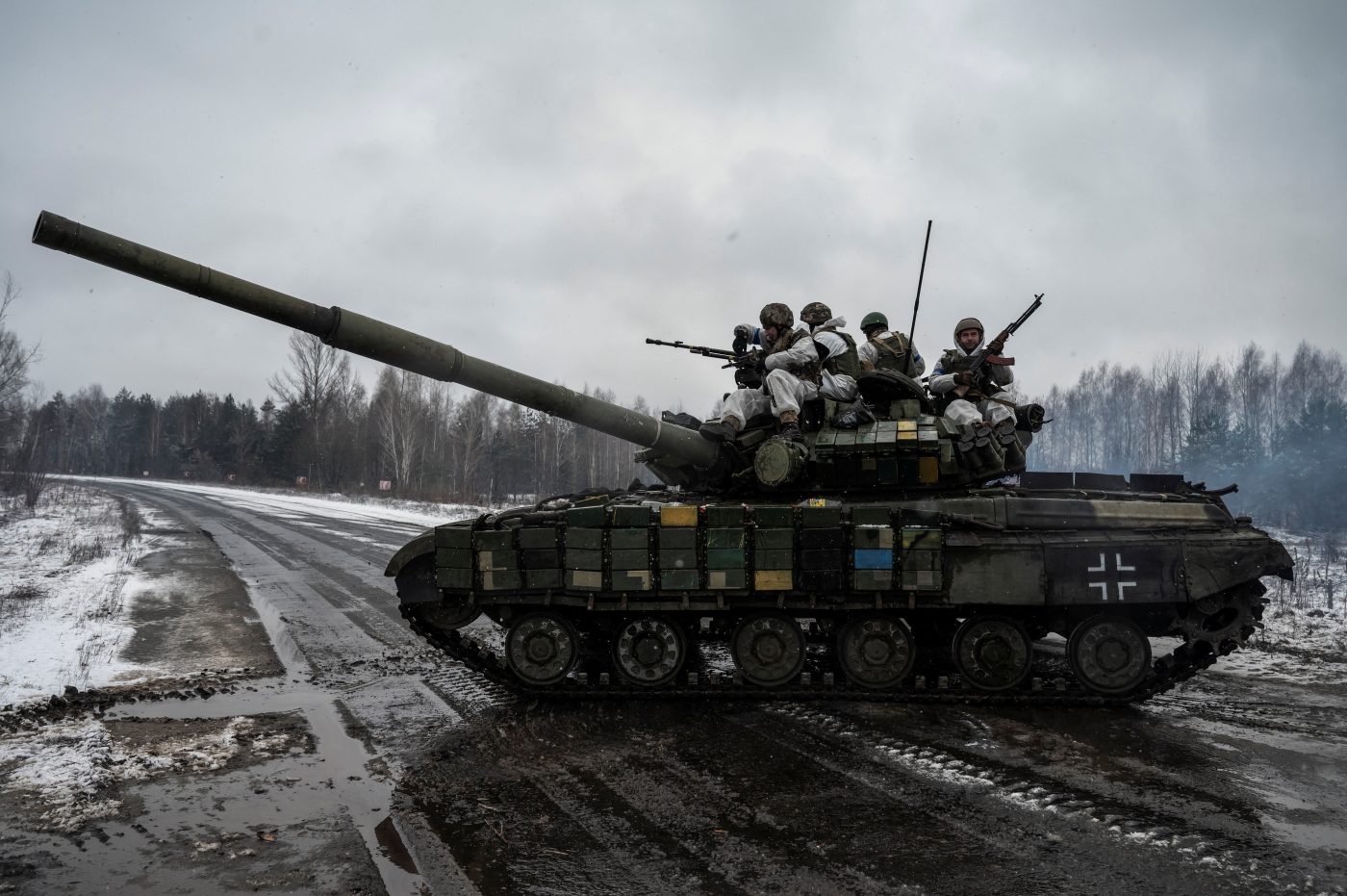 Photo: Ukrainian servicemen ride atop of a tank during drills of armed forces at the border with Belarus, amid Russia's attack on Ukraine, near Chornobyl, Ukraine February 3, 2023. Credit: REUTERS/Viacheslav Ratynskyi