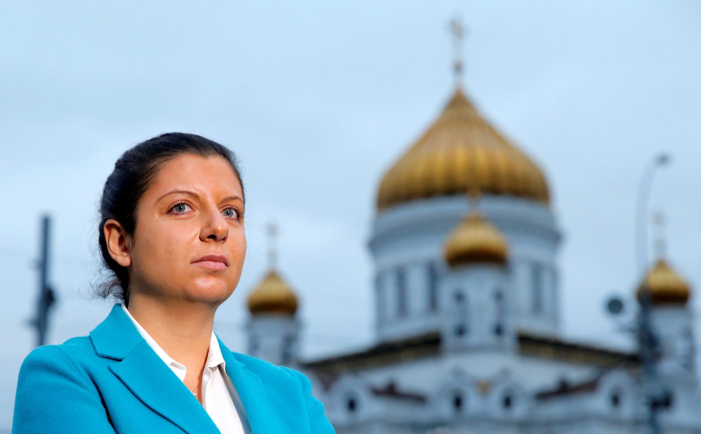 Photo: Margarita Simonyan, editor-in-chief of Russian broadcaster RT, meets with journalists, with the Cathedral of Christ the Saviour seen in the background, in Moscow, Russia, October 17, 2016. Credit: REUTERS/Maxim Shemetov