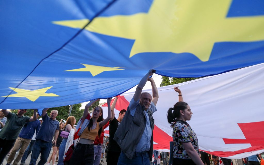 Photo: People attend a mass demonstration in support of the country's membership in the European Union in Tbilisi, Georgia June 20, 2022. Credit: REUTERS/Irakli Gedenidze