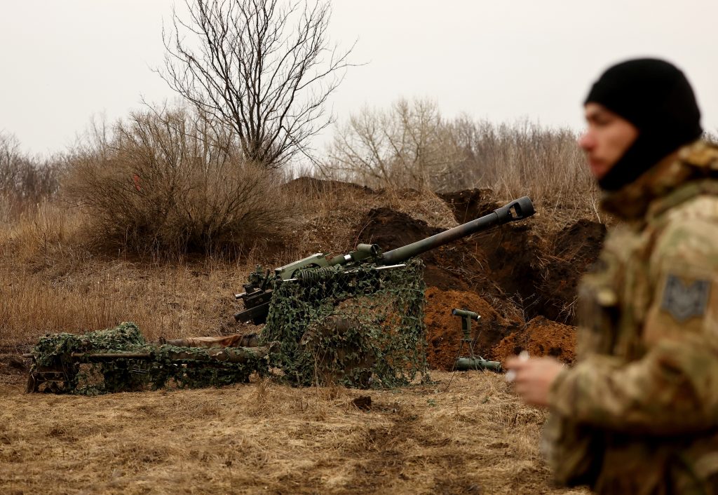 Photo: A Ukrainian serviceman waits for order to fire a M119 howitzer near the frontline town of Bakhmut amid Russia's attack on Ukraine, Donetsk region, Ukraine March 8, 2023. Credit: REUTERS/Lisi Niesner