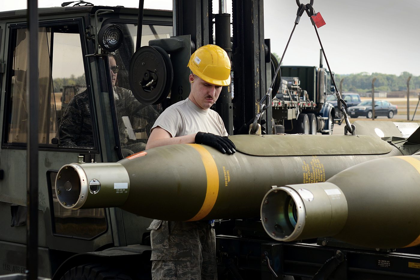Photo: A 48th Fighter Wing munitions Airman prepares a GBU-24 Paveway III laser-guided bomb for transport during the United States Air Forces in Europe-Air Forces Africa’s inaugural Combat Ammunition Production Exercise July 17, 2018. During the exercise, munitions experts demonstrated their ability to build a variety of munitions including joint air-to-surface standoff missiles, air-to-air missiles, joint direct attack munitions, laser-guided bombs and small diameter bombs. Credit: U.S. Air Force photo/ Tech. Sgt. Matthew Plew via dvids