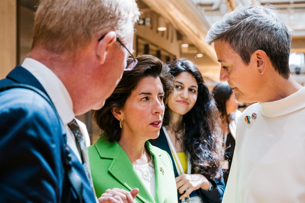 Photo: United States Secretary of Commerce Gina Raimondo, center, and, European Commissioner for Competition Margrethe Vestager, right, speak during a Transatlantic Tech Council Meeting in Paris, May 15, 2022. Credit: Jean-Louis Carli/European Commission.