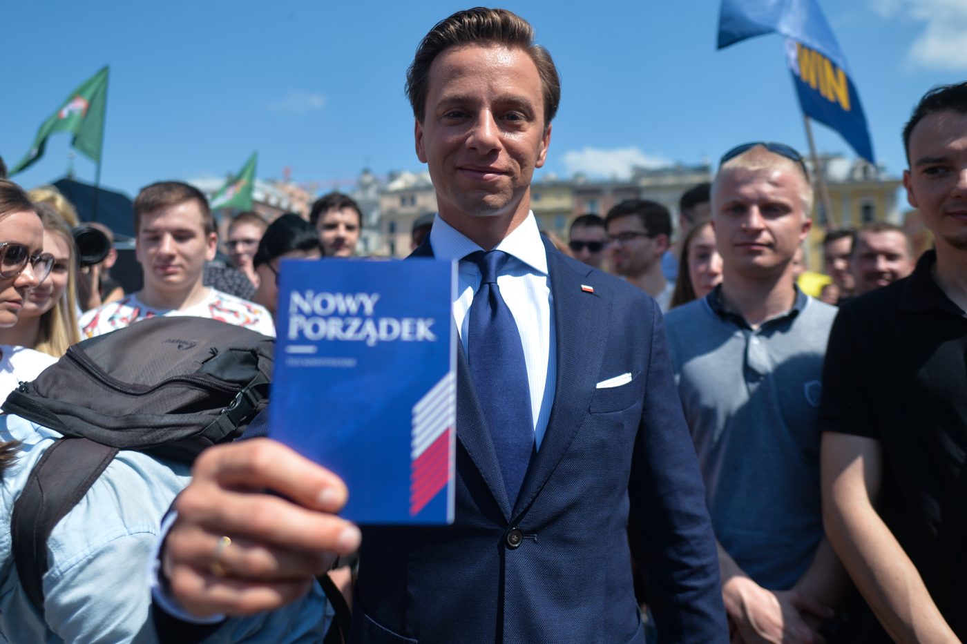 Photo: Krzysztof Bosak, Confederation Liberty and Independence political party candidate for the presidential election 2020, holds a copy of his programme during a Presidential Election Campaign Rally, in Krakow's Main Market Square. On June 13, 2020, in Krakow, Lesser Poland Voivodeship, Poland. Credit: Artur Widak/NurPhoto