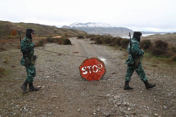 Photo: Azeri service members guard the area, which came under the control of Azerbaijan's troops following a military conflict over Nagorno-Karabakh against ethnic Armenian forces and a further signing of a ceasefire deal, on the border with Iran in Jabrayil District, December 7, 2020. Picture taken December 7, 2020. Credit: REUTERS/Aziz Karimov