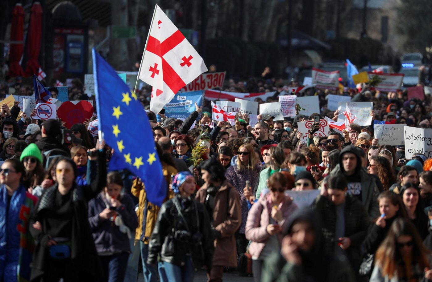 Photo: Participants march during a protest against a draft law on "foreign agents", which critics say represents an authoritarian shift and could hurt Georgia's bid to join the European Union, in Tbilisi, Georgia, March 8, 2023. Credit: REUTERS/Irakli Gedenidze