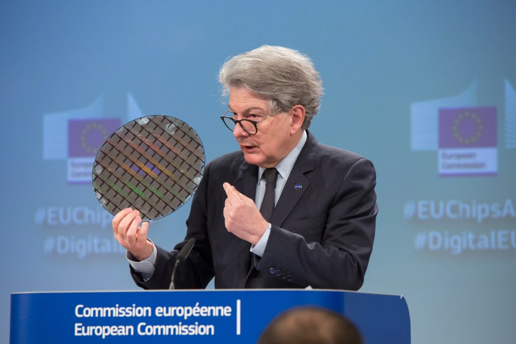 Photo: European Commissioner for the Internal Market Thierry Breton at the podium holding a chip wafer in Brussels, Belgium on August 2, 2023. Credit: Aurore Martignoni / European Commission. https://audiovisual.ec.europa.eu/en/photo-details/P-054451~2F00-11 