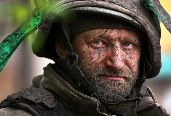 Photo: A Ukrainian serviceman looks on as he returns from heavy fighting amid Russia’s attack on Ukraine, close to Bakhmut, Ukraine, April 15, 2023. Credit: REUTERS/Kai Pfaffenbach