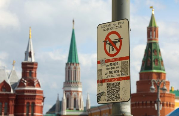 Photo: A sign prohibiting unmanned aerial vehicles flying over the area is on display near the State Historical Museum and the Kremlin wall in central Moscow, Russia, May 3, 2023. Credit: REUTERS/Evgenia Novozhenina 