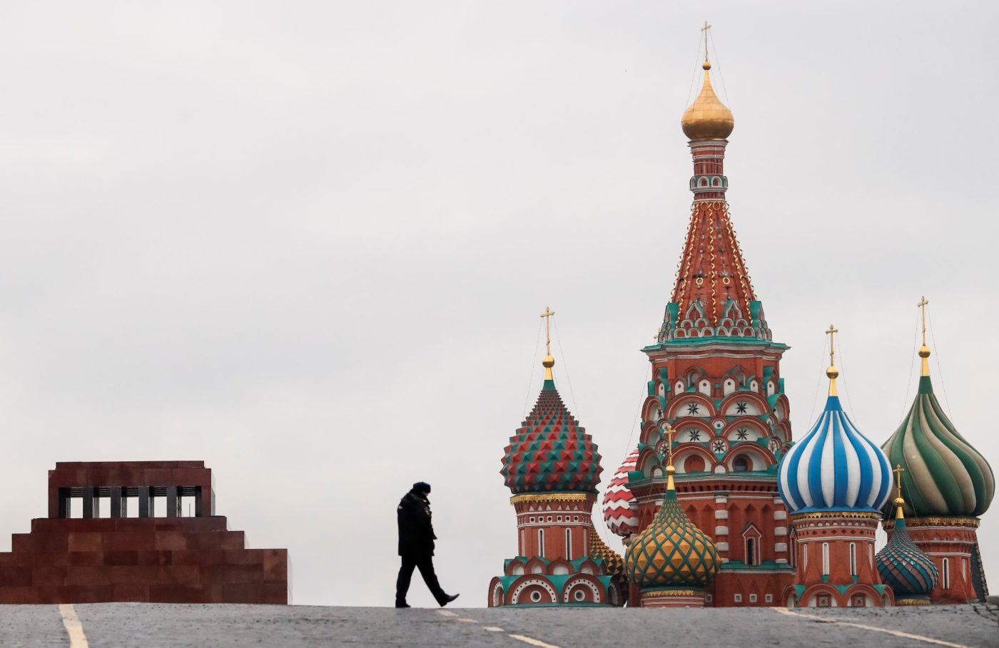 Photo: A police officer walks along the Red Square, with St. Basil's Cathedral and the Mausoleum of Soviet state founder Vladimir Lenin seen in the background, in Moscow, Russia November 5, 2017. Credit: REUTERS/Grigory Dukor