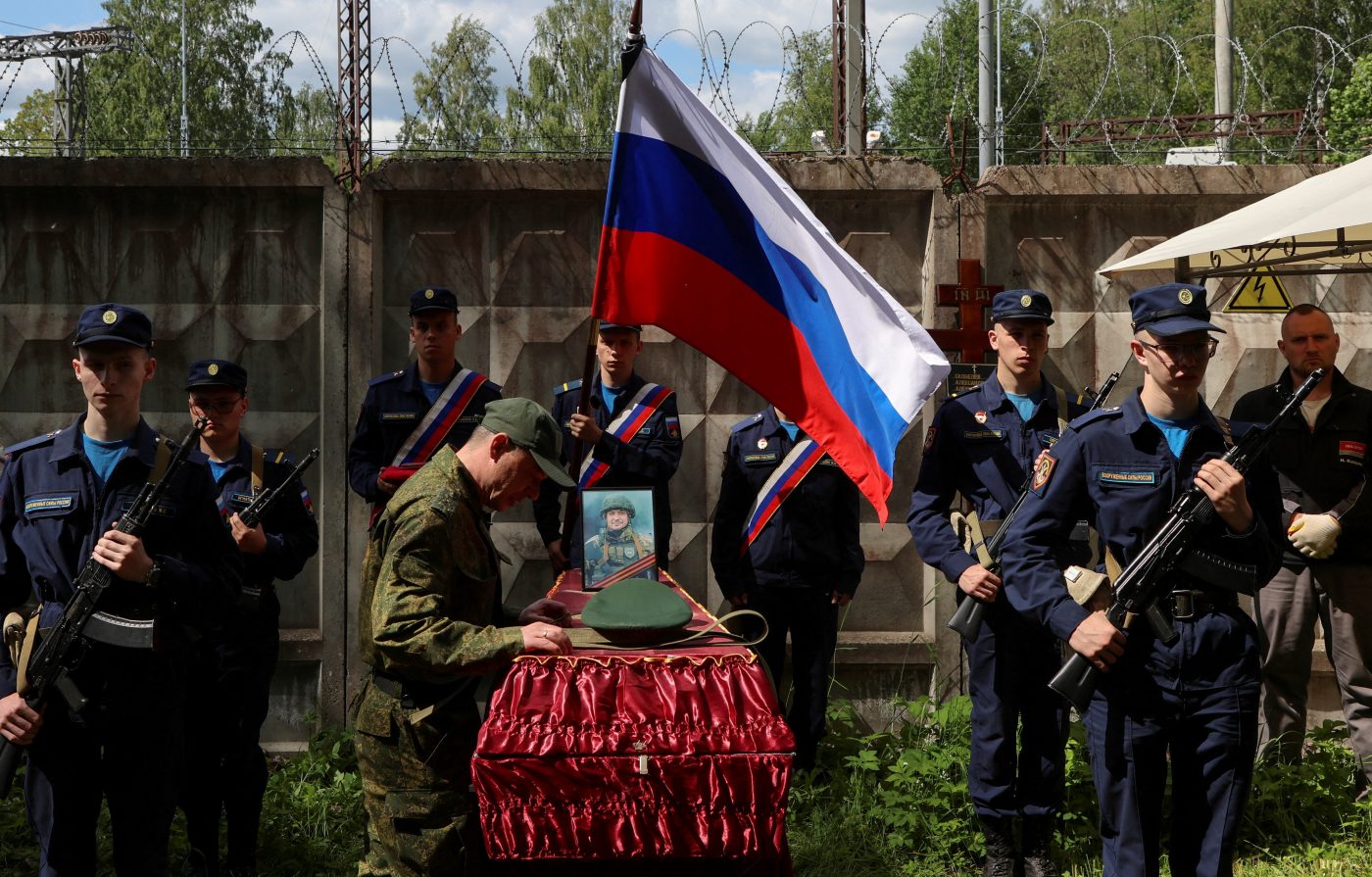 Photo: People attend the funeral of Alexander Skobelev, junior sergeant of the Russian armed forces killed in the course of Russia-Ukraine conflict, at a cemetery in the town of Shlisselburg in the Leningrad region, Russia, June 8, 2023. Credit: REUTERS/Anton Vaganov