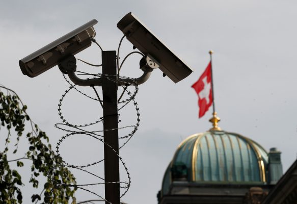 Photo: A surveillance camera (CCTV) of the Swiss National Bank (SNB) is pictured in front of the Swiss Federal Palace (Bundeshaus) in Bern, Switzerland, July 2, 2018. Picture taken July 2, 2018. Credit: REUTERS/Denis Balibouse