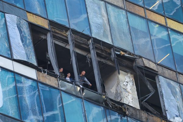 Photo: Members of security services investigate a damaged office building in the Moscow City following a reported Ukrainian drone attack in Moscow Russia, August 1, 2023. Credit: REUTERS/Evgenia Novozhenina